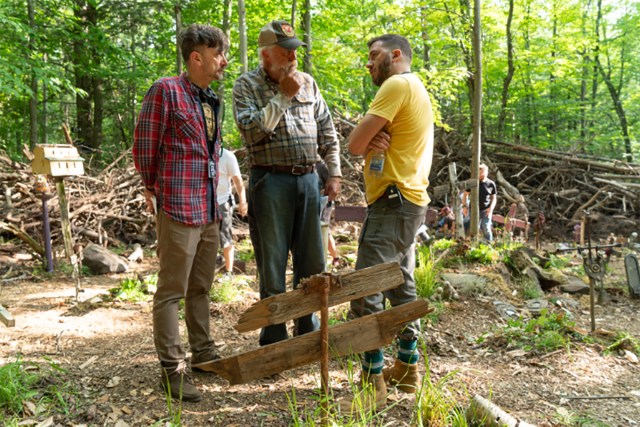 (L–R) Kölsch, John Lithgow, and Widmyer on the set. Photo by Kerry Hayes / 2019 Paramount Pictures