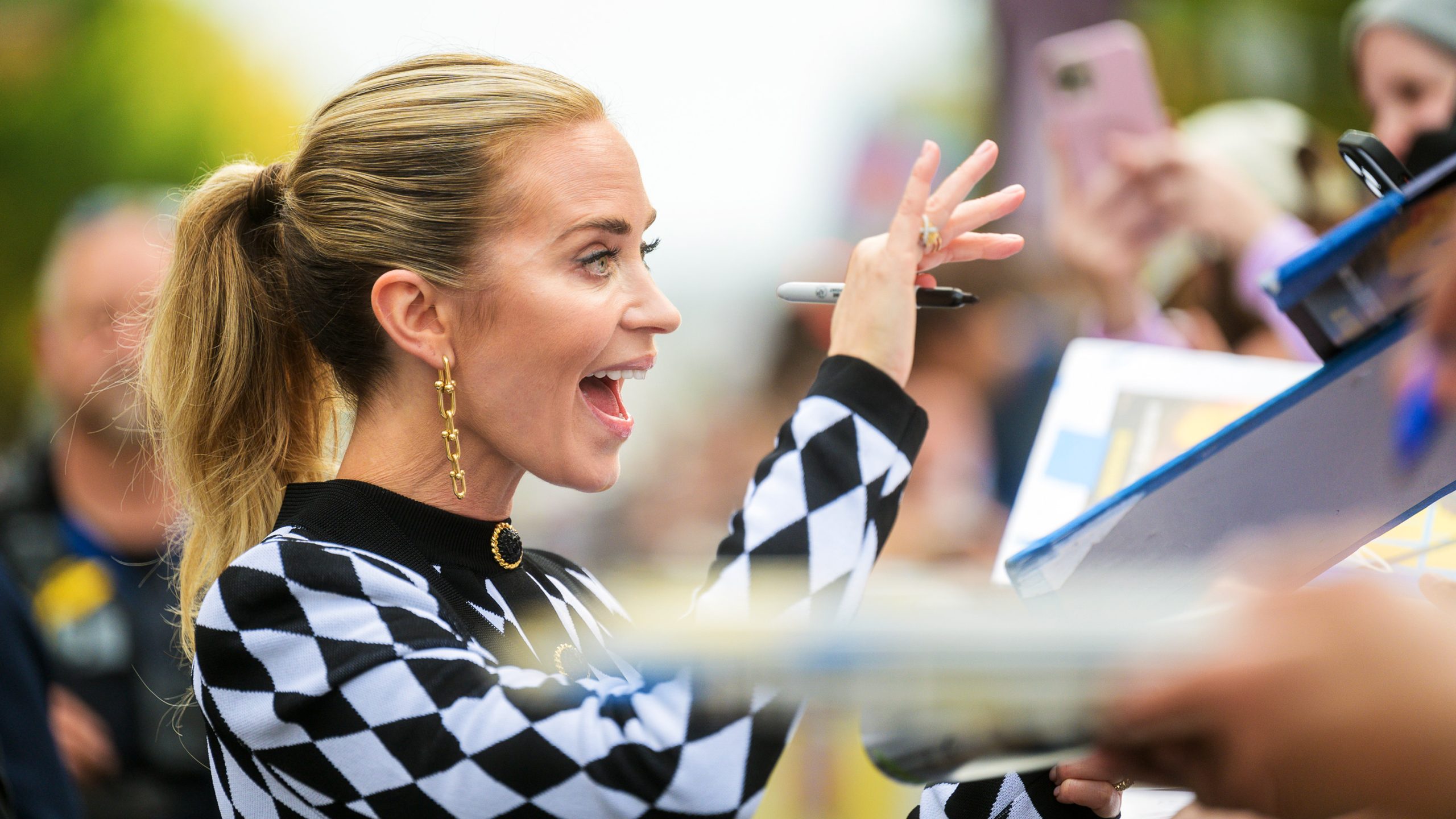 Emily Blunt waving to fans at the SXSW 2024 