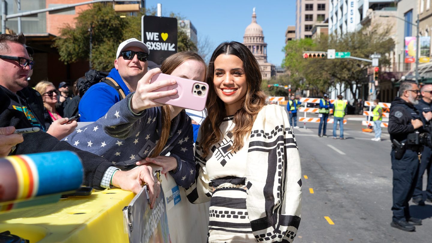 Natalie Morales poses with fans at the My Dead Friend Zoe SXSW 2024 World Premiere - Photo by Hutton Supancic