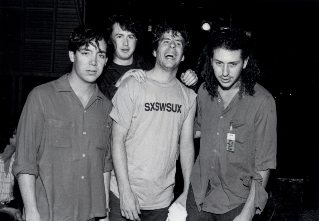 Miles Zuniga, Bill David, Mojo Nixon & Ricky Gelb at SXSW 1989. Photo by Martha Grenon.