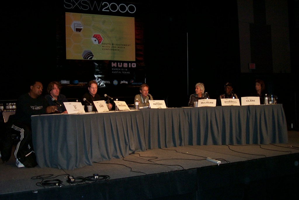 Chuck D, Peter Case, Roger McGuinn, Joe Nick Patoski, Ian McLagan, Bernie Worrell, & Terri Clark at SXSW Music 2000. Photo by Gary Miller.